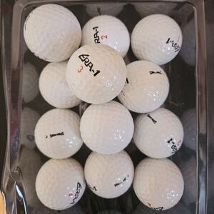12 ERA Spalding golf balls‎